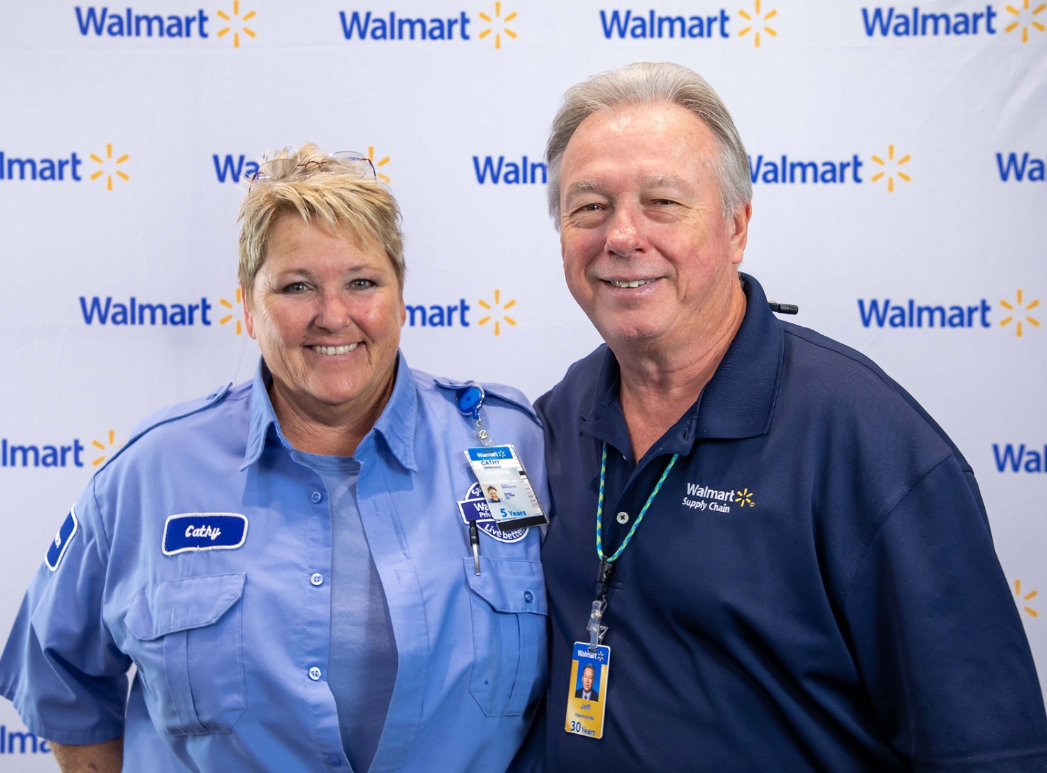 Cathy Swisegood poses with Walmart Private Fleet Operations Vice President Jeff Hammonds